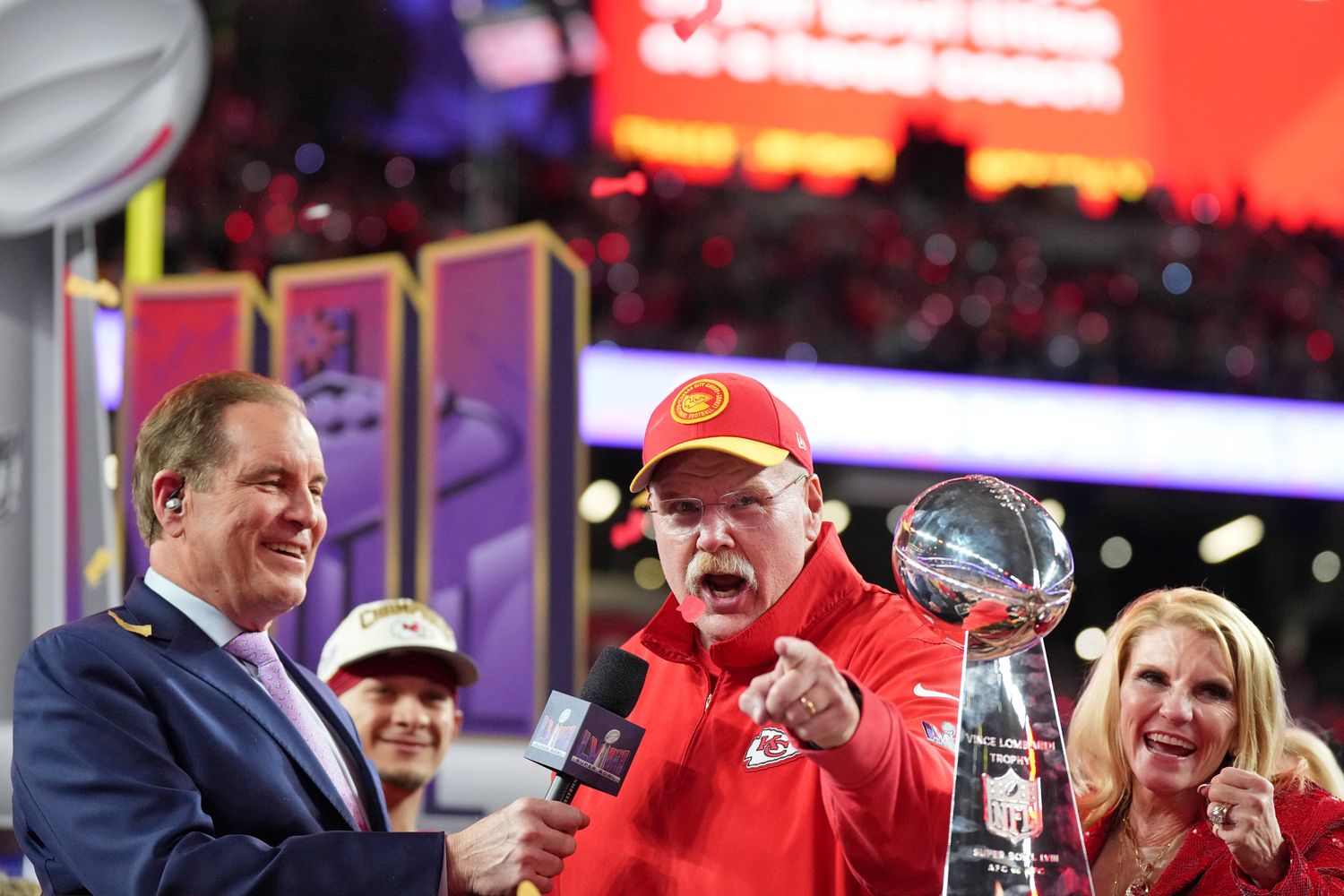 Feb 11, 2024; Paradise, Nevada, USA; Kansas City Chiefs head coach Andy Reid celebrates while being interviewed by CBS commentator Jim Nantz after winning Super Bowl LVIII against the San Francisco 49ers at Allegiant Stadium. Mandatory Credit: Kirby Lee-USA TODAY Sports  